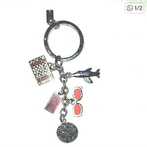 Coach Vintage World Traveler Silver and Red Keychain with Charms. Retired